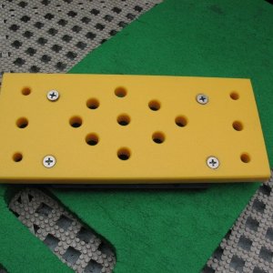 Back side of the plate.  Since I could pre-mount the black Bennett bracket I was able to use countersunk fasteners and tighten them (vs. needing them to not spin).  The additional holes are just for lightening since all that material was not needed.