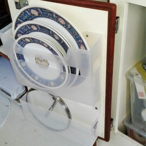 Standard plastic file holders make simple plate storage alternative to teak racks