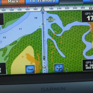 Garmin 740 Chart plotter w/ Radar in "Overlay" mode.
The radar is in \"Overlay\" mode and shows as orange on the screen.  Inter-coastal waterway Florida entering the St John River.  We found the radar could often pick up navigation buoys before our eye could find them.  Very confidence building in strange waters.