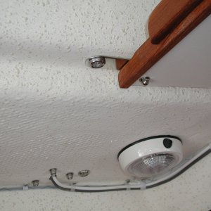 Shelf secured to #2 roof rail post bolt.