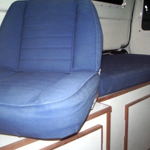 Swivel seat.  Also gain of one inch in height.  (with hidden galley same height as helm seat, swivel works great)