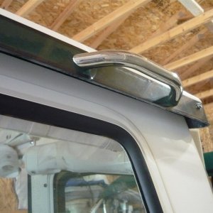 extra-grab-handle.  Grab handles also added to swim step, brow, v-berth entrance, overhead port and starboard.