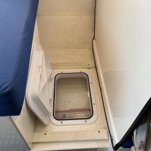 Cut in 2 hatches for storage under seat.
