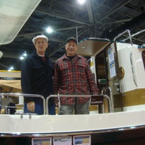 Joe (R-MATEY) 
& Jon (C-LOU)...
This could be Jon's next boat but Cynthia doesn't know it yet...LOL