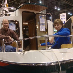 Looks like the crew of the KIM CHRISTINE on board a Ranger Tug. Oh, oh!