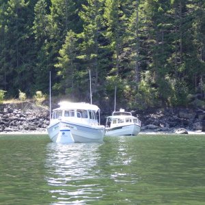 Returning from my 2-hours of floating around in the kayak to find a 25 anchored next door.