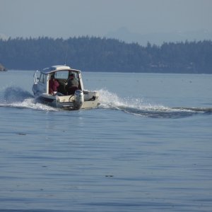 A 16 Cruiser heading out of the canal as I was returning