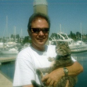 Aug 2006 - Bellingham 
   Jim & Molly aka 
the C-Brat Boat Cat 
     WILD BLUE