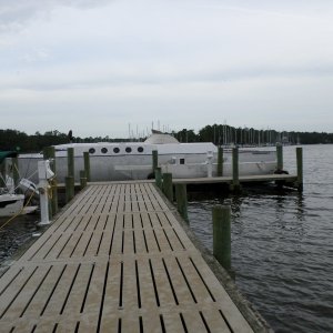 Homemade boat. Trimaran. Powered by twin outboards. No motors. Very rough shape