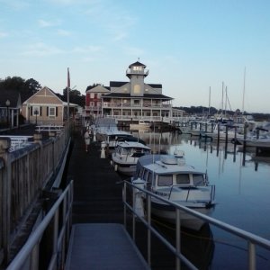 Three C- Dories tied up at the dock at Smithfield Station.