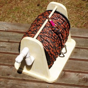 Stern tie reel and line. 3/8 poly from HD, empty wire spool.