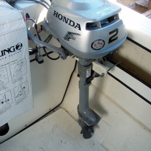 Dinghy motor mounted, note pad at prop.
