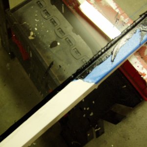 This shows the effect of masking.  Excess urethane can be easily trimmed from the glass but not the frame.