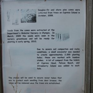 Sign describing the restoration efforts for the old airstrip.