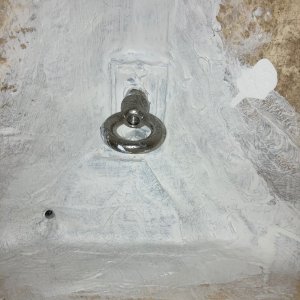 layers of glass and epoxy followed by epoxy paint (light coat on the inside of the drain as well)