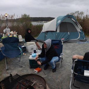 camp with dory on the dock