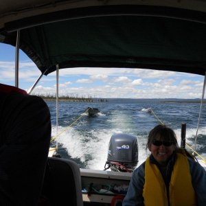 Leaving the windy west thumb - Julie enjoying her first trip on the lake, July 3rd 2010