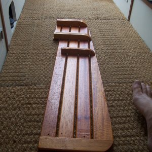 Another angle. The ribs step up in height, to allow for the sloping floor. It makes for a flat floor in the Head. Three screws hold each outside piece to the center. The two wings are removed, and then the center is lifted out.
