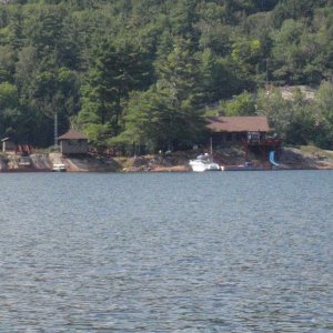 Evinrudes cabin at the entrance to The Pool of Baie Finn