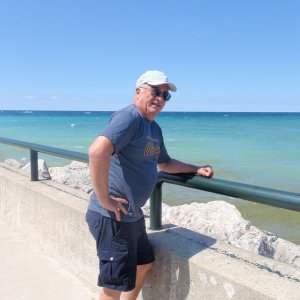 Captain on jetty to Lake Michigan at Charlevoix