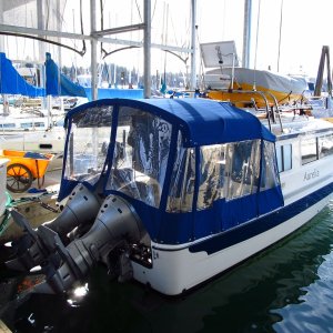 7ft tall in there and just two vertical poles per side allow for a large single/main opening for fishing/elbow room (not that we fish much)