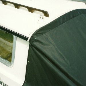*Drifter's*  CockPit Cover..installer left the awning bolt ( rope )longer than the rail..said to cut it if i wanted to..