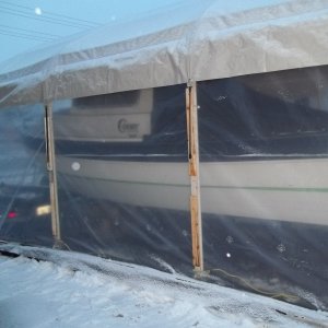 4/20/2011  started to build a plastic enclosure around my boat but it started to snow again