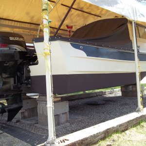 9/5/2011..3rd coat of Pettit Hydrocoat/removed plastic paint shed..ALL DONE!