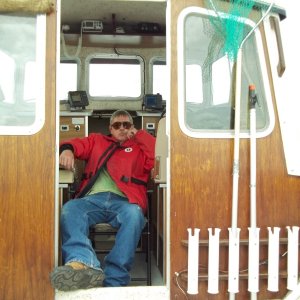 25/05/2011..just enough room inside the Classic Anglers cabin for a comfortable chair.Have a line out but the fish aren't co-operating.
