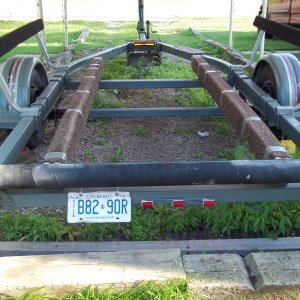 July 29/11...1987 EZ-Loader trailer with aft roller...the information stamped on the roller was..Lawrence 4" Marine Wet Exhaust..SAE J2006R1   1998