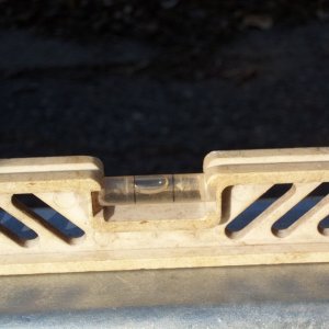 06/10/2011.. placed level on forward section of the tongue...close enough for leaf springs on a tandem