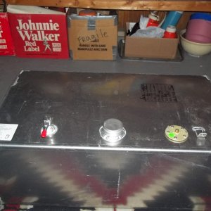 Jan/30/12...New Gas Tank ( 29 Gallons ) from Tom @ Coastline Equipment: can i rotate the fuel line fitting 90 degree's ( one with red cap )or would i break or damage it )