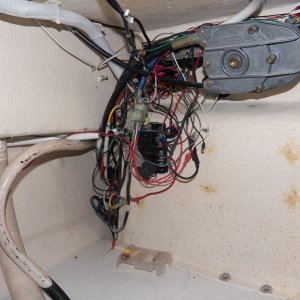 All of the electrical wiring just hangs loose on the back of the helm, which is in the V berth on the 16.  I've still got a few more modifications (like a negative buss bar) and then I need to cover it up.
