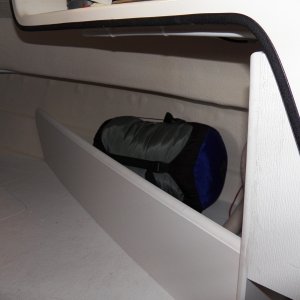 Because of the angle, it doesn't really effect the amount of usable space in the V berth and adds a lot of room for a week's worth of clothing, etc.