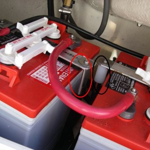 Golf cart battery installation. Detail of spacers.