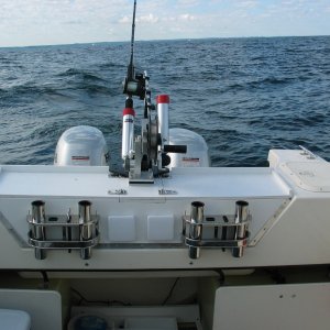 (Not For Hire) Center downrigger with two rod holders.