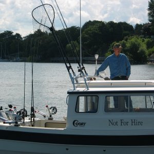 Media '(Not For Hire) Boat at dock showing radar arch and rod holders, etc.' in album 'Lake Michigan King, 1 of 9 taken Aug 10, 04 and a steelie too'