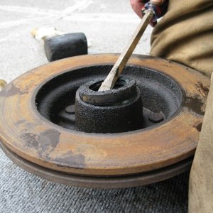 Pry off rear seal with a large screwdriver.