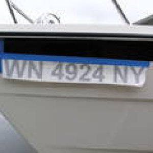 Same for the reg numbers. Measure, step back, eye-ball it, mearure again.  The reg numbers were much easier though, due to the black line in the gel coat as a guide.