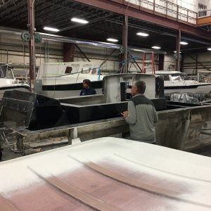 Looking over towards the final assembly and rigging area, with the C-Dory 19 deck mold in foreground