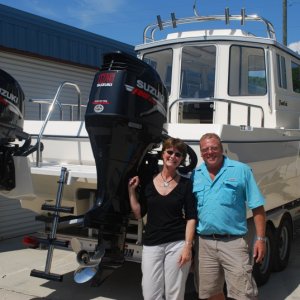 Linda with Marc Grove, owner of Wefings Marine in Eastpoint Florida where we purchased Destiny in September 2009
