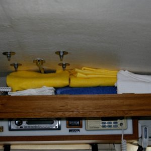 Console Shelf Door Down shows storage area for towels and misc books.