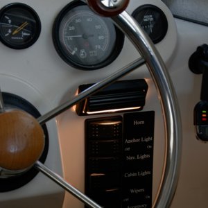 Flip light provides directed light onto the control switch panel. Very useful at dusk when you can't see the panel but do not want bright lights while your eyes adjust to the dark.