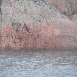 Colorful rocks along small craft channel