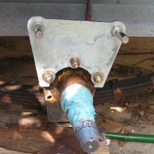 New galvanized Tie Down Engrg backing plate (it's actually mounted at a perfect 12 o'clock, but photo taken at an angle).
