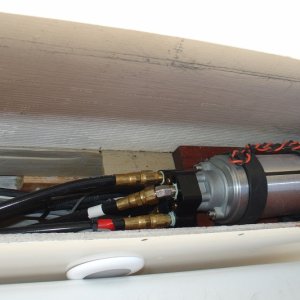 Autopilot pump underneath starboard coaming box
