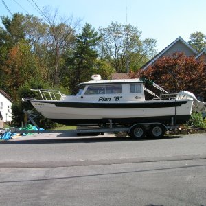 (Stanley-J) After a 19 hour trip home from St. Louis. I had to cut a tree  down to get the boat in the driveway...great planning"