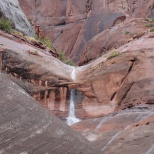 Oak Canyon waterfall.  Waterfall is under arch.  In the past we didn't know there was a arch here & it was only after the rain did we see ihe water flowing under instead of over.