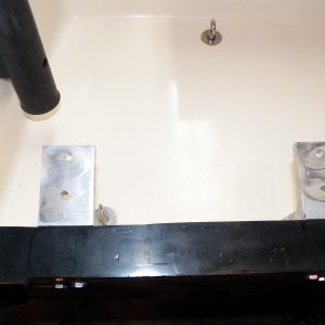 I fabricated brackets that bolted through the transom.