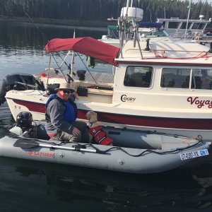 Jody taking Maggie for a ride on his new Kaboat